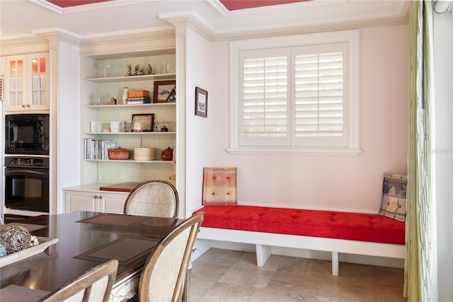 interior space with crown molding