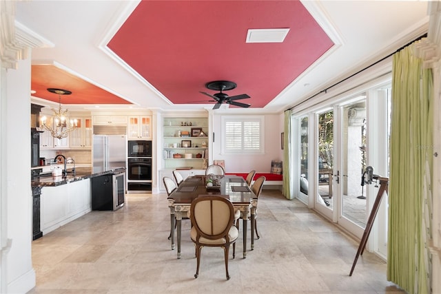 8213 Midnight Pass Rd, Sarasota, FL 34242 - dining room with visible vents, ceiling fan with notable chandelier, a tray ceiling, and french doors