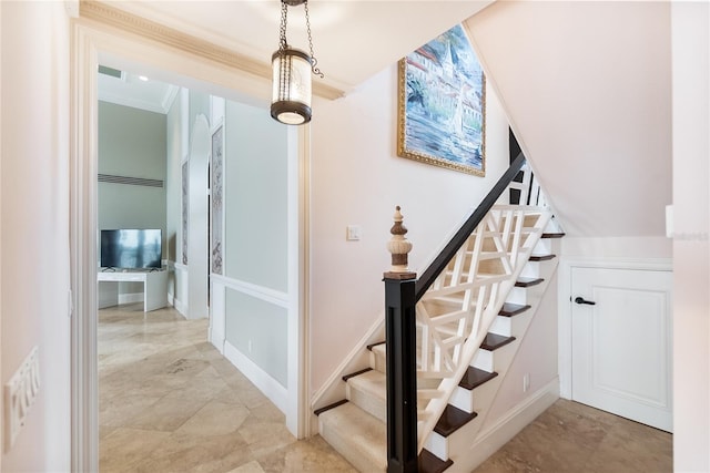 stairs with crown molding