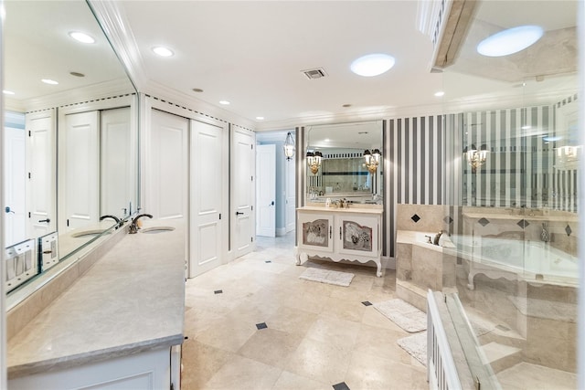 bathroom with vanity, crown molding, and independent shower and bath