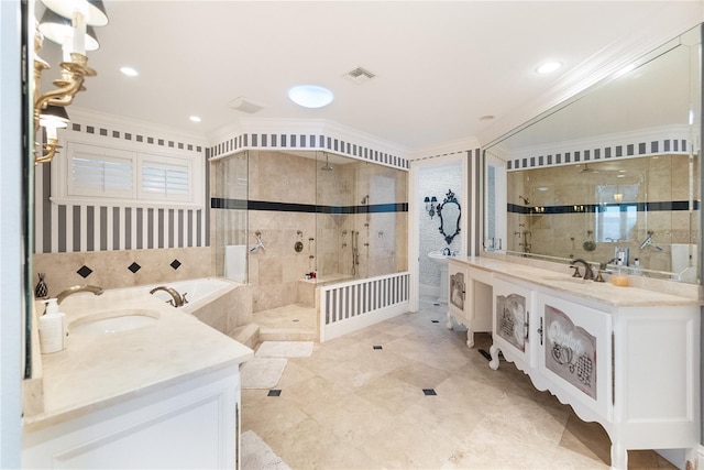 bathroom with vanity, crown molding, and independent shower and bath