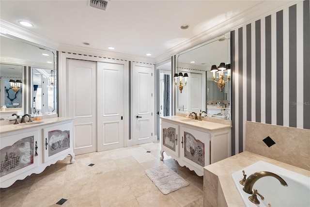 bathroom with vanity, crown molding, and a relaxing tiled tub