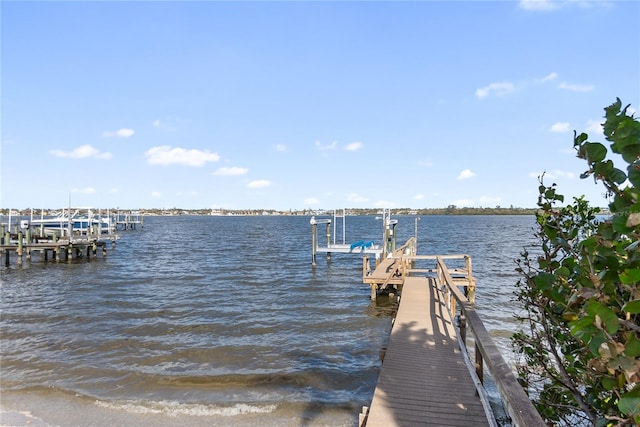 view of dock with a water view