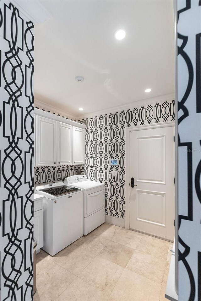 8213 Midnight Pass Rd, Sarasota, FL 34242 - laundry room featuring recessed lighting, cabinet space, washer and dryer, and wallpapered walls
