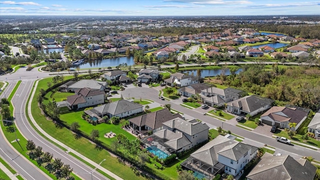 drone / aerial view with a water view