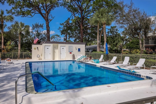 view of pool featuring a patio