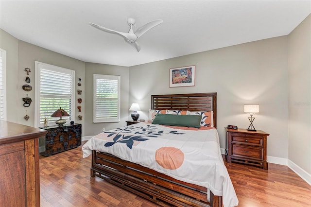 bedroom with light wood-type flooring and ceiling fan