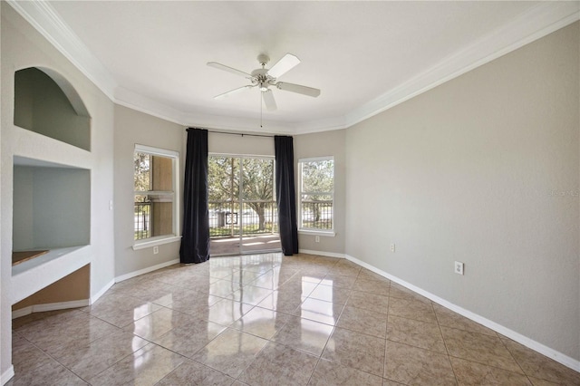 tiled empty room featuring crown molding and ceiling fan