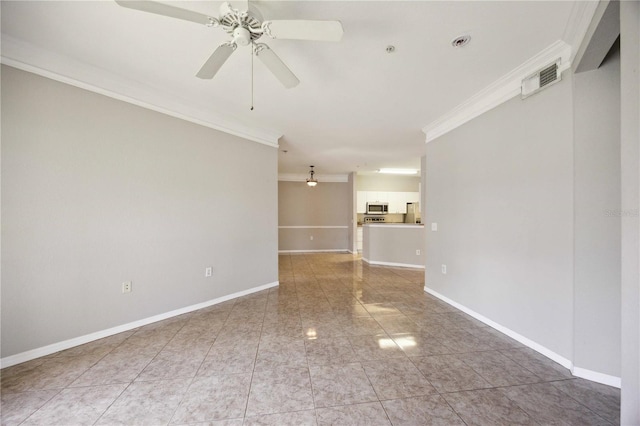 unfurnished room with ornamental molding and ceiling fan