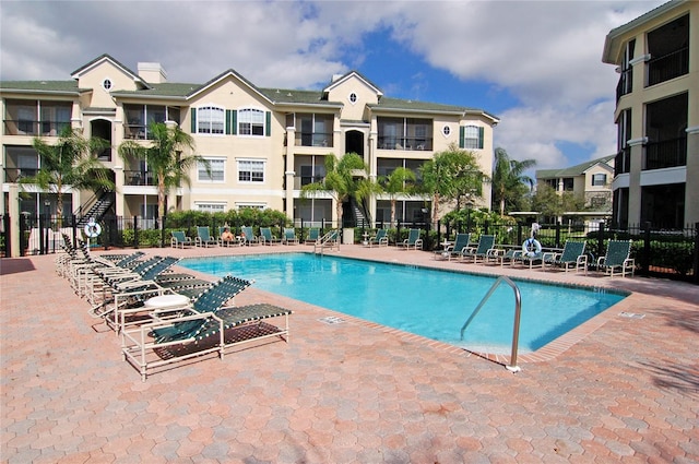 view of pool featuring a patio