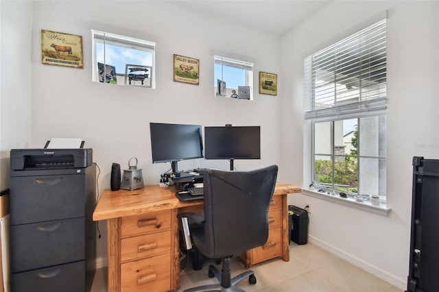 office space with light tile patterned flooring