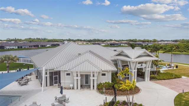 view of property with a water view