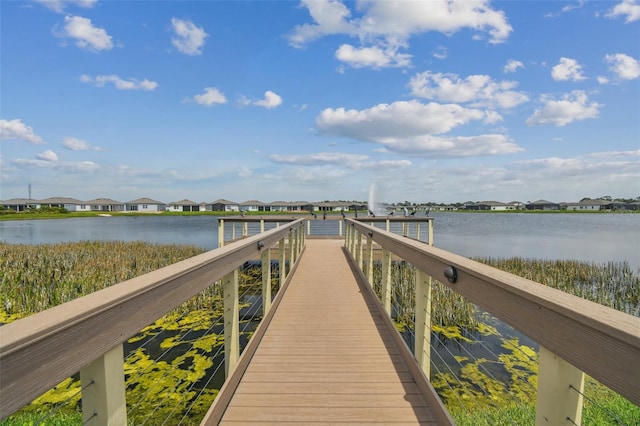 view of dock with a water view