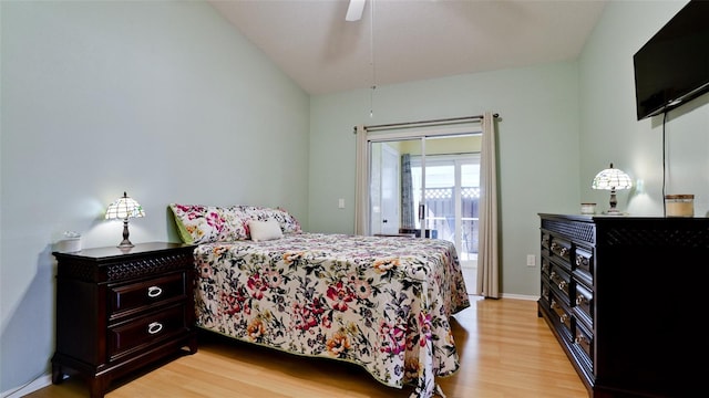 bedroom featuring lofted ceiling, light hardwood / wood-style floors, and ceiling fan