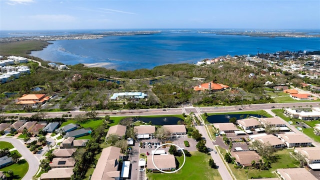 aerial view with a residential view and a water view