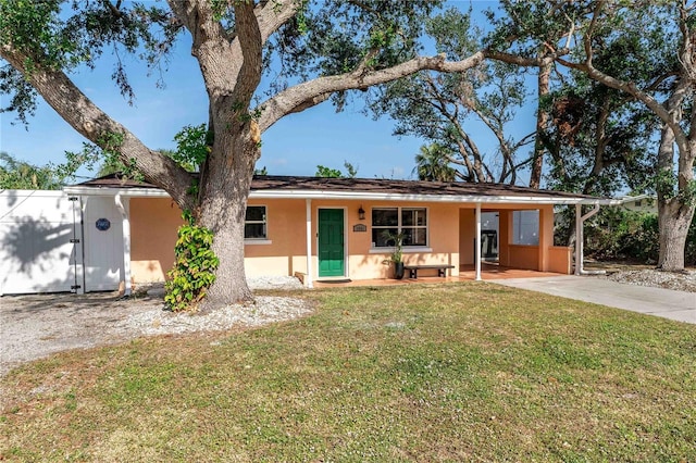 ranch-style home with a front yard