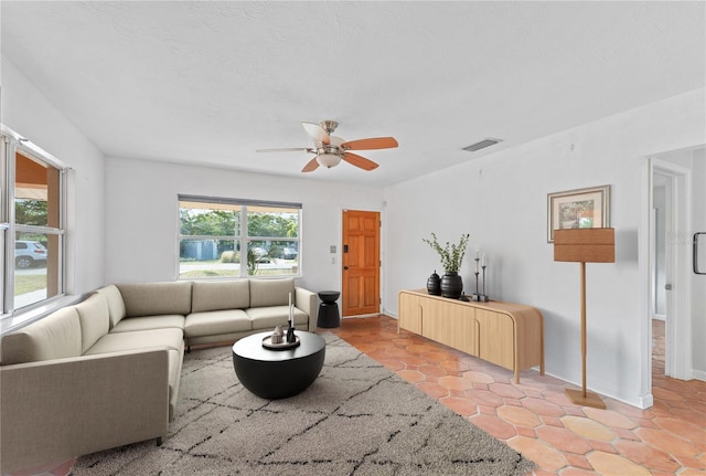 living room featuring ceiling fan