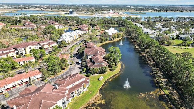 aerial view with a water view and a residential view