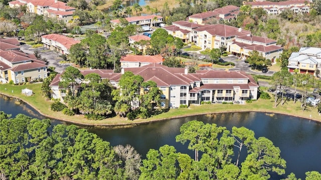 aerial view with a residential view and a water view