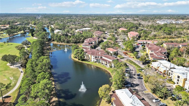 bird's eye view with a water view and a residential view