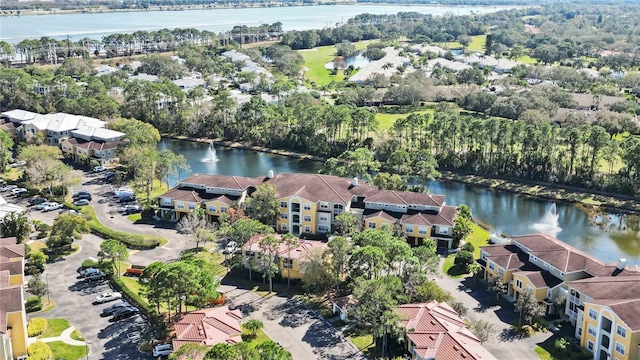 aerial view with a water view and a residential view