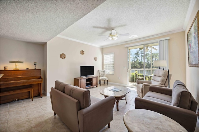 living room featuring light tile patterned floors, ornamental molding, and a ceiling fan