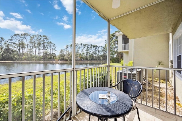 balcony featuring a water view