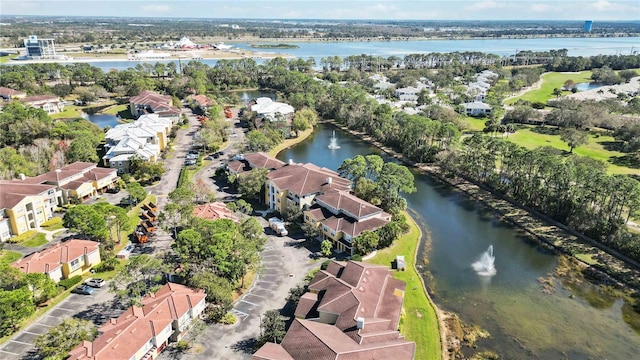 birds eye view of property with a residential view and a water view