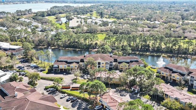 aerial view with a water view and a residential view