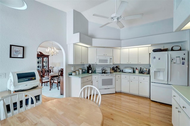 kitchen featuring light hardwood / wood-style floors, white cabinetry, ceiling fan with notable chandelier, and white appliances