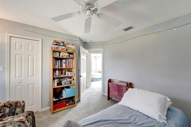 bedroom featuring a closet, carpet flooring, and ceiling fan