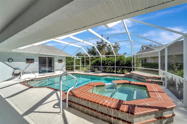 view of pool with an in ground hot tub, a patio, and glass enclosure