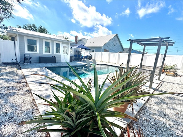 view of pool with a pergola