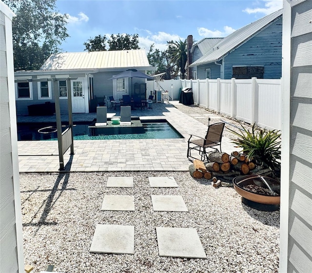 view of swimming pool with a patio