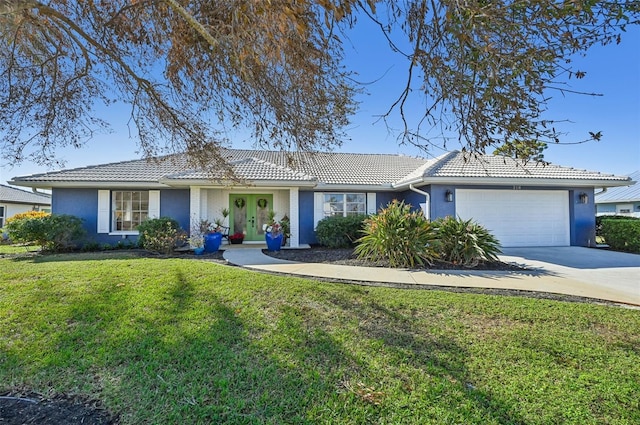 single story home with a front lawn and a garage