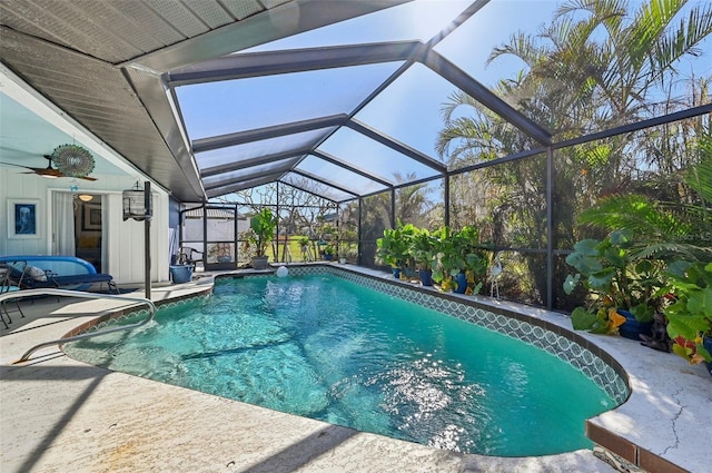 view of pool with a patio area, a lanai, and ceiling fan