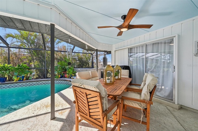 sunroom with ceiling fan and a pool