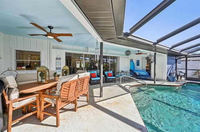 218 Brandywine Cir, Englewood, FL 34223 - exterior space featuring a ceiling fan, an outdoor pool, glass enclosure, outdoor lounge area, and outdoor dining space