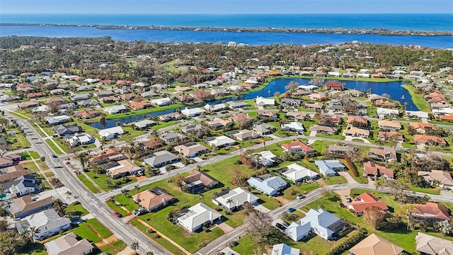 drone / aerial view featuring a water view