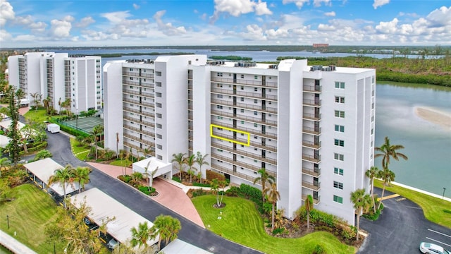 view of property with a water view