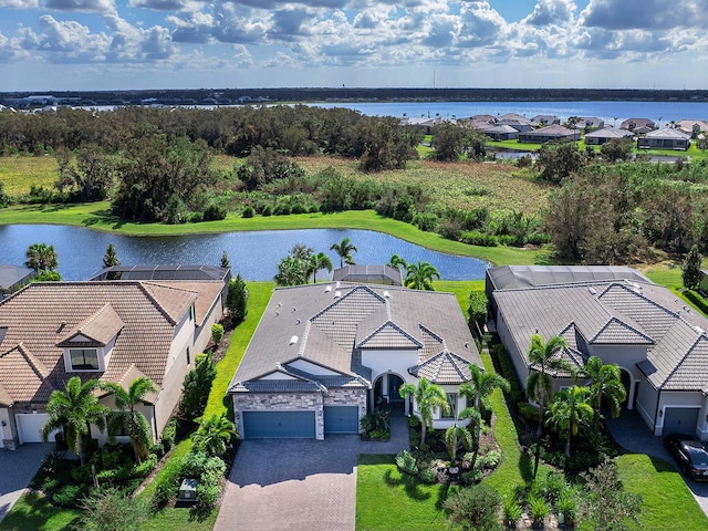 bird's eye view with a water view