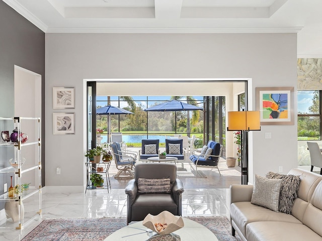 living room with a water view and crown molding