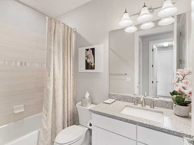 full bathroom with a notable chandelier, vanity, toilet, and shower / tub combo