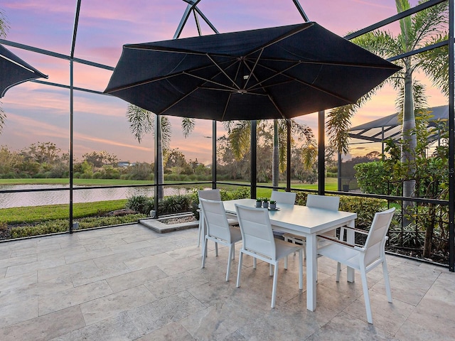 patio terrace at dusk with glass enclosure