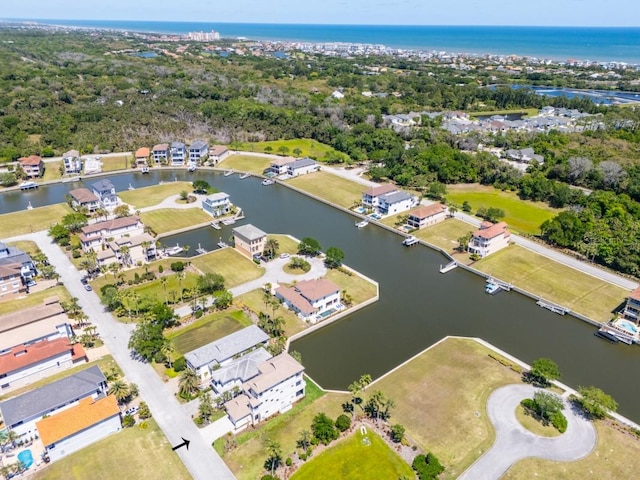 bird's eye view with a water view