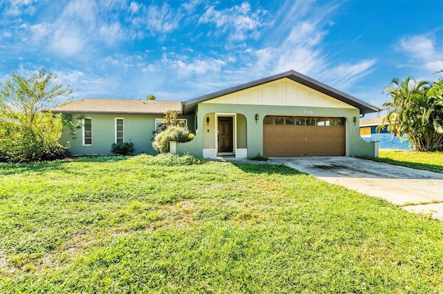 ranch-style house with a garage and a front yard