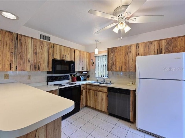 kitchen with ceiling fan, sink, light tile patterned floors, and white appliances