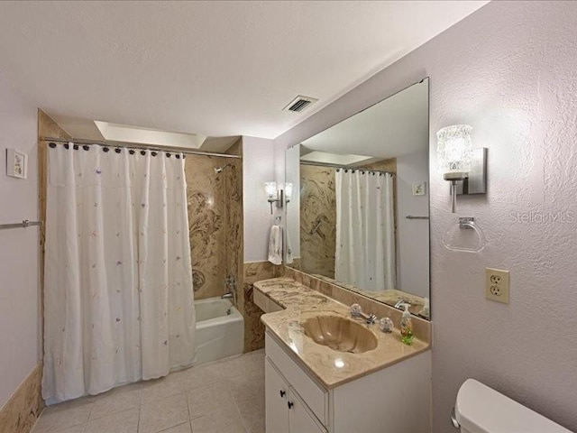 full bathroom featuring vanity, shower / tub combo with curtain, toilet, and tile patterned flooring