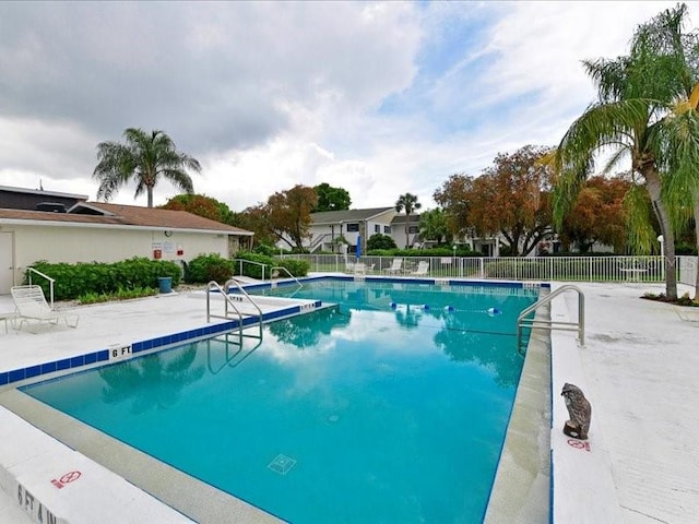 view of pool featuring a patio