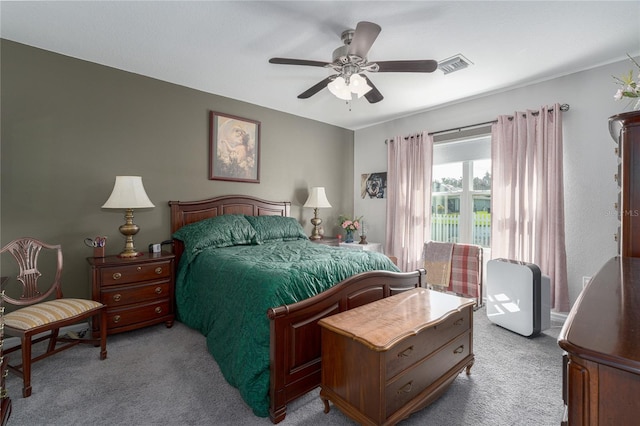 bedroom with light colored carpet and ceiling fan